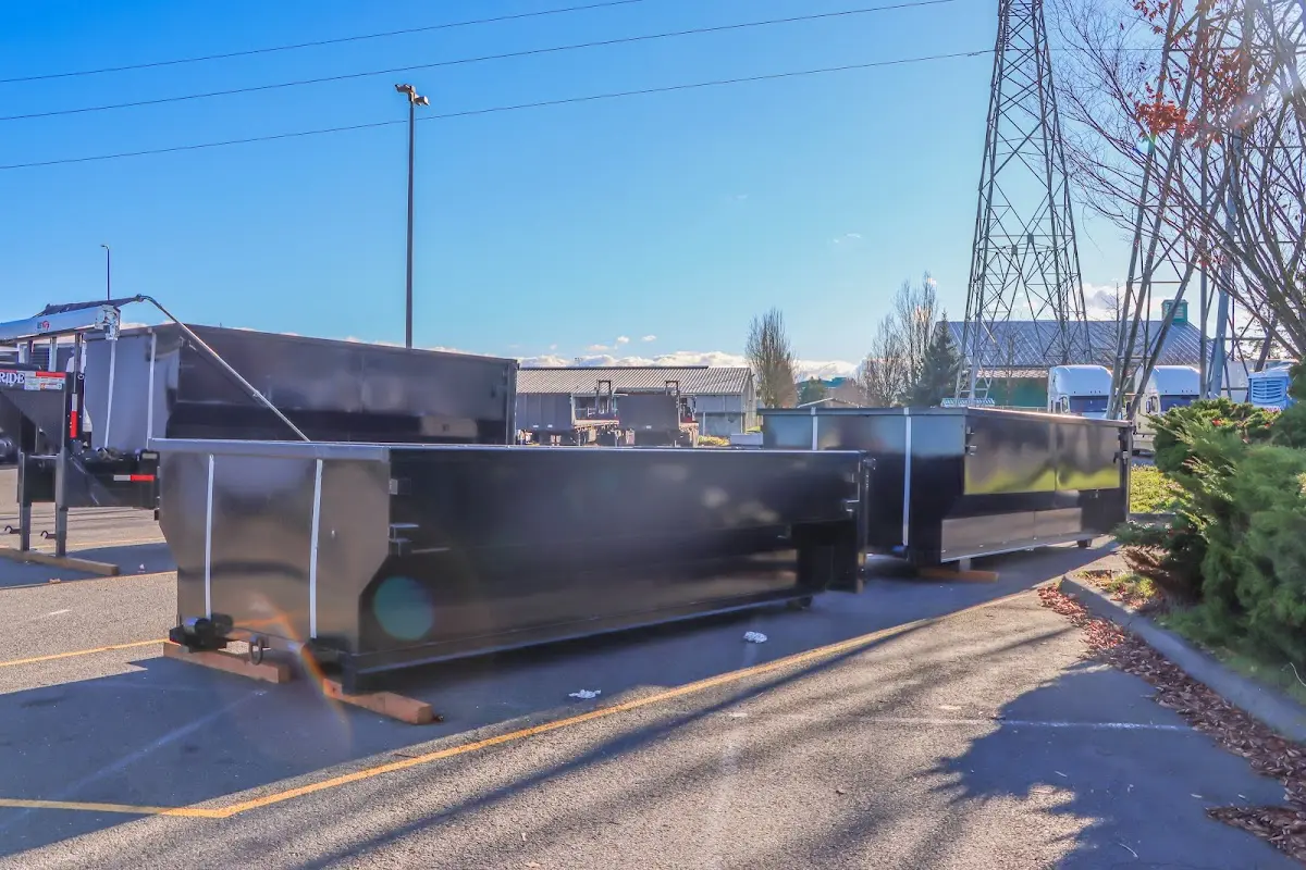 Roll-off dumpster ready for waste disposal at job site for Roofing Dumpster Rental in Wayne